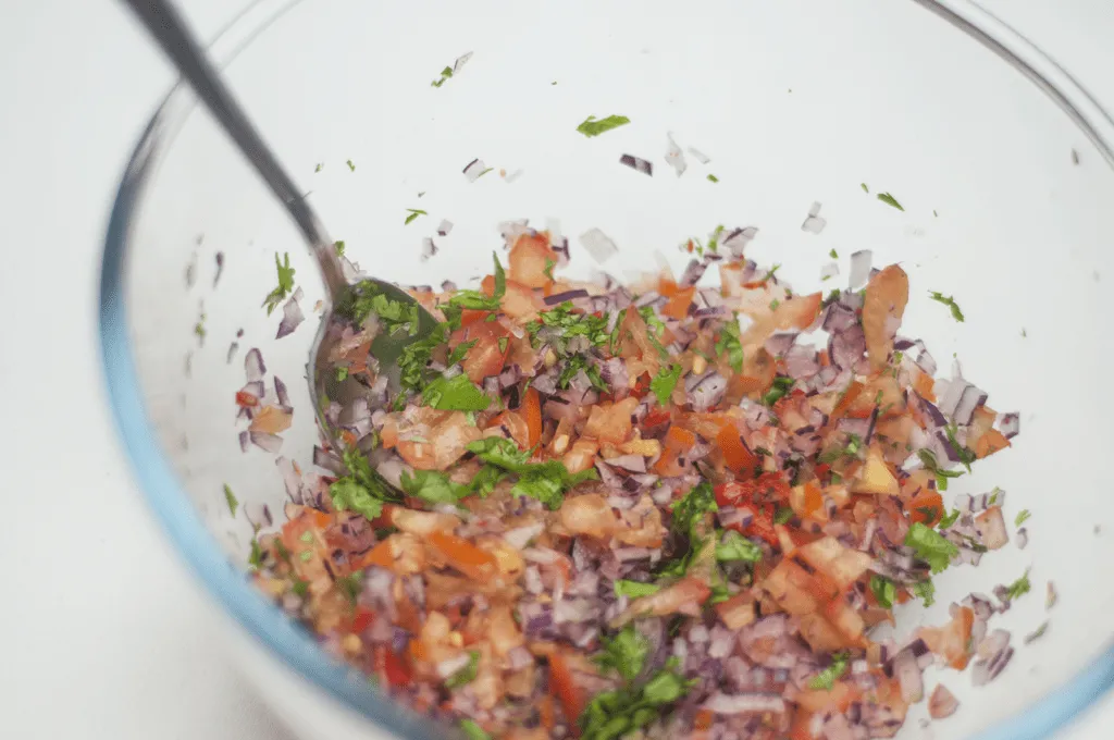 Adding the herbs and chilli