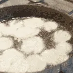 shallow frying parsnip slices