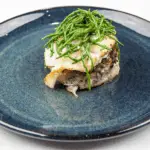 Pan fried cod with classic beurre blanc sauce. This is a fantastic recipe and very versatile with how it can be served. I placed the cod on a potato rosti and topped it with samphire. Seafood with vegetables from the sea. Yum! | https://theyumyumclub.com