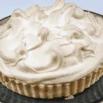 Lemon meringue pie! What a classic. Lovely sweet meringue, zesty sharp lemon, and a melt in the mouth pastry. Yummy! | https://theyumyumclub.com