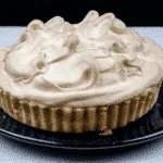 Lemon meringue pie! What a classic. Lovely sweet meringue, zesty sharp lemon, and a melt in the mouth pastry. Yummy! | https://theyumyumclub.com