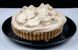 Lemon meringue pie! What a classic. Lovely sweet meringue, zesty sharp lemon, and a melt in the mouth pastry. Yummy! | https://theyumyumclub.com