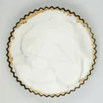 Lemon meringue pie! What a classic. Lovely sweet meringue, zesty sharp lemon, and a melt in the mouth pastry. Yummy! | https://theyumyumclub.com
