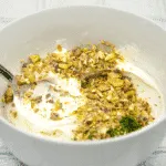 Cream cheese, crushed pistachio and dill
