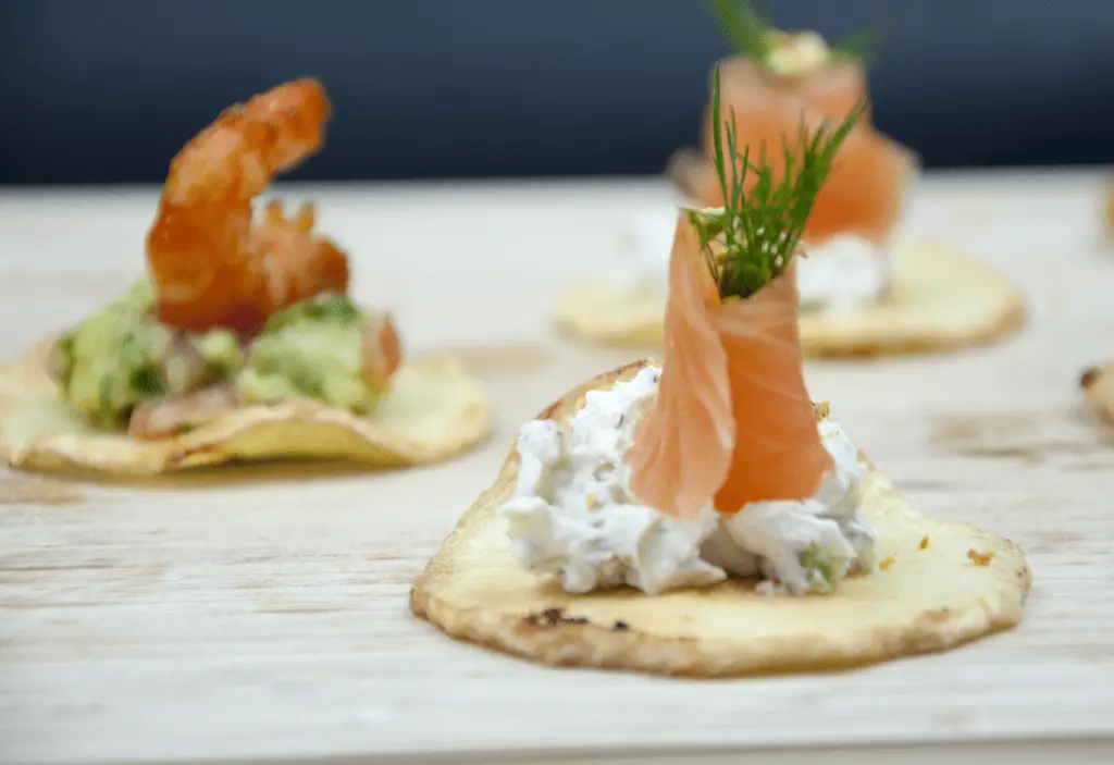 Seafood parsnip canapes. Simple to make and so tasty. Great for any event. Thanksgiving. Christmas. We ❤ making this recipe. These canapes always impress our friends. Real fresh food that you won't believe. | https://theyumyumclub.com