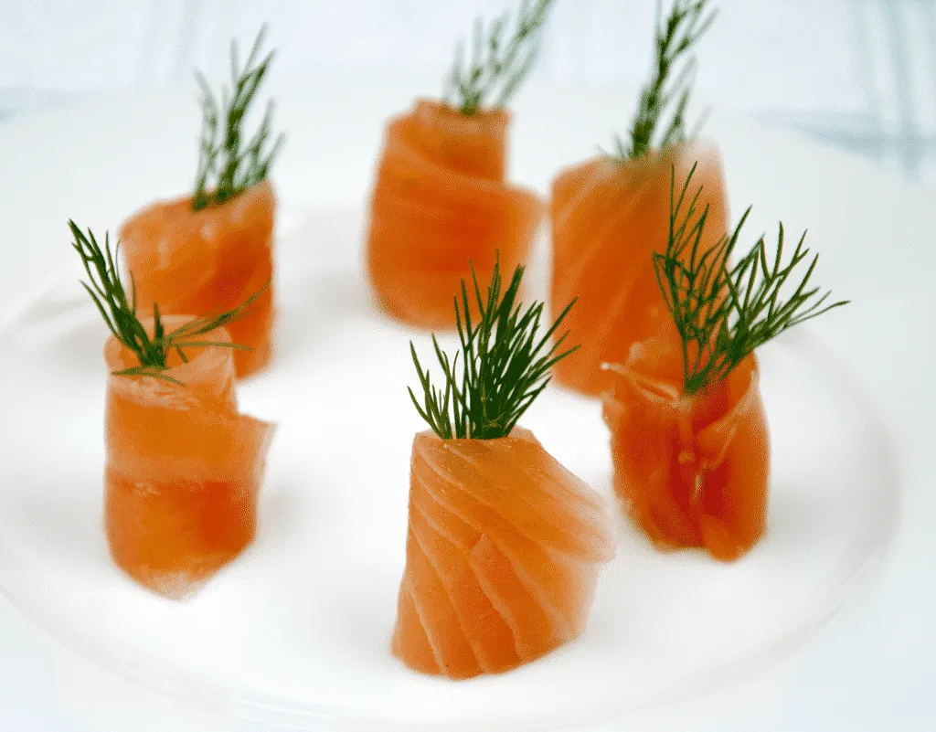 Seafood parsnip canapes. Simple to make and so tasty. Great for any event. Thanksgiving. Christmas. We ❤ making this recipe. These canapes always impress our friends. Real fresh food that you won't believe. | https://theyumyumclub.com