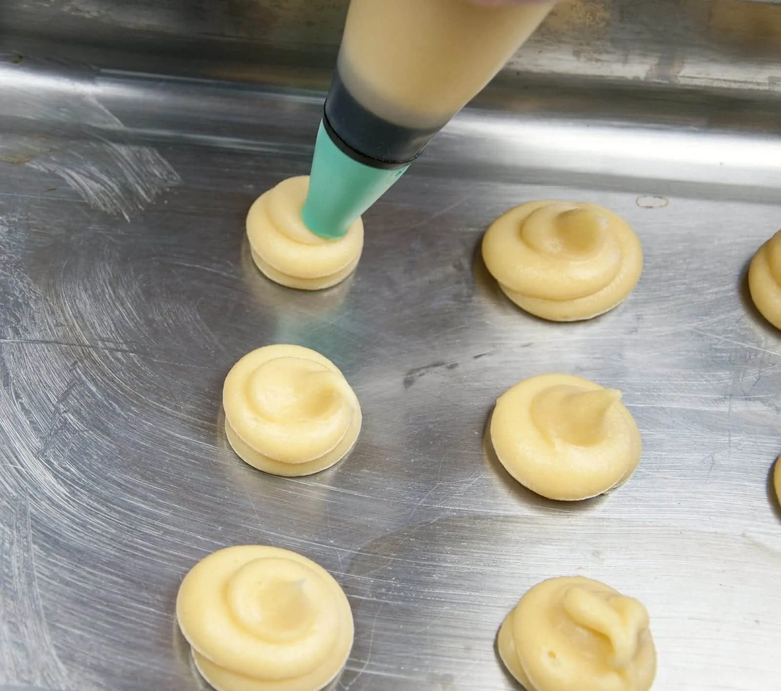 Profiteroles Recipe - How to make the finest profiteroles. Simple and easy. YOU can make them today. Choux buns, cream and chocolate! YUM! | https://theyumyumclub.com