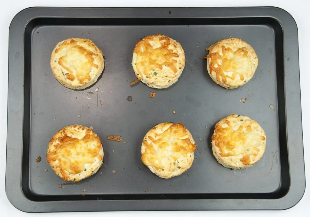 Cheese and chive scones. I love these savoury beauties. Serve with just a good helping of butter, or use as croutons with some wonderful warming soup. Yum! | theyumyumclub.com