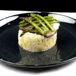 Pan-fried cod with leek risotto! What a seafood recipe. Such a tasty dish & very veratile. I used cod but use any seafood with this risotto. Yum! | theyumyumclub