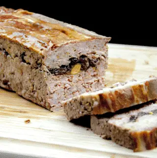 Duck, pork, cranberry and pistachio terrine. A wonderful recipe for your Christmas table. Very festive and a great appetiser before the turkey. Learn how to make this irresistible rustic farmhouse terrine. Yum Yum!! | theyumyumclub.com