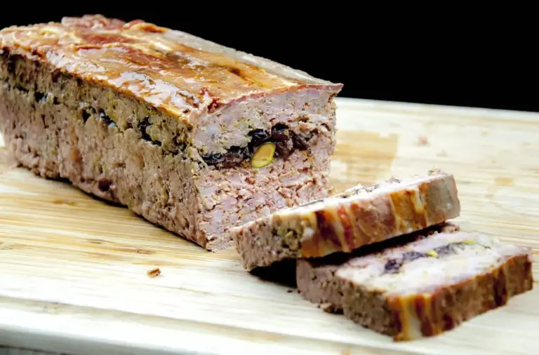 Duck, pork, cranberry and pistachio terrine. A wonderful recipe for your Christmas table. Very festive and a great appetiser before the turkey. Learn how to make this irresistible rustic farmhouse terrine. Yum Yum!! | theyumyumclub.com