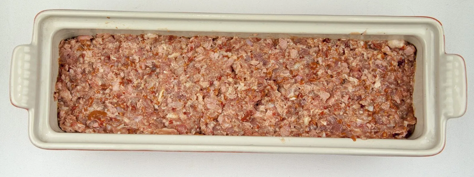 Duck, pork, cranberry and pistachio terrine. A wonderful recipe for your Christmas table. Very festive and a great appetiser before the turkey. Learn how to make this irresistible rustic farmhouse terrine. Yum Yum!! | theyumyumclub.com