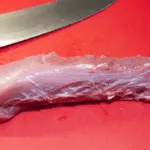 Roasted Pork fillet smothered in Dijon mustard and coated in prosciutto. Tender and juicy pork fillet. This is a wonderfully tasty pork dish. Very easy to make with only 3 ingredients and ready in 30 minutes. Low fat and healthy pork. Yum! | theyumyumclub.com