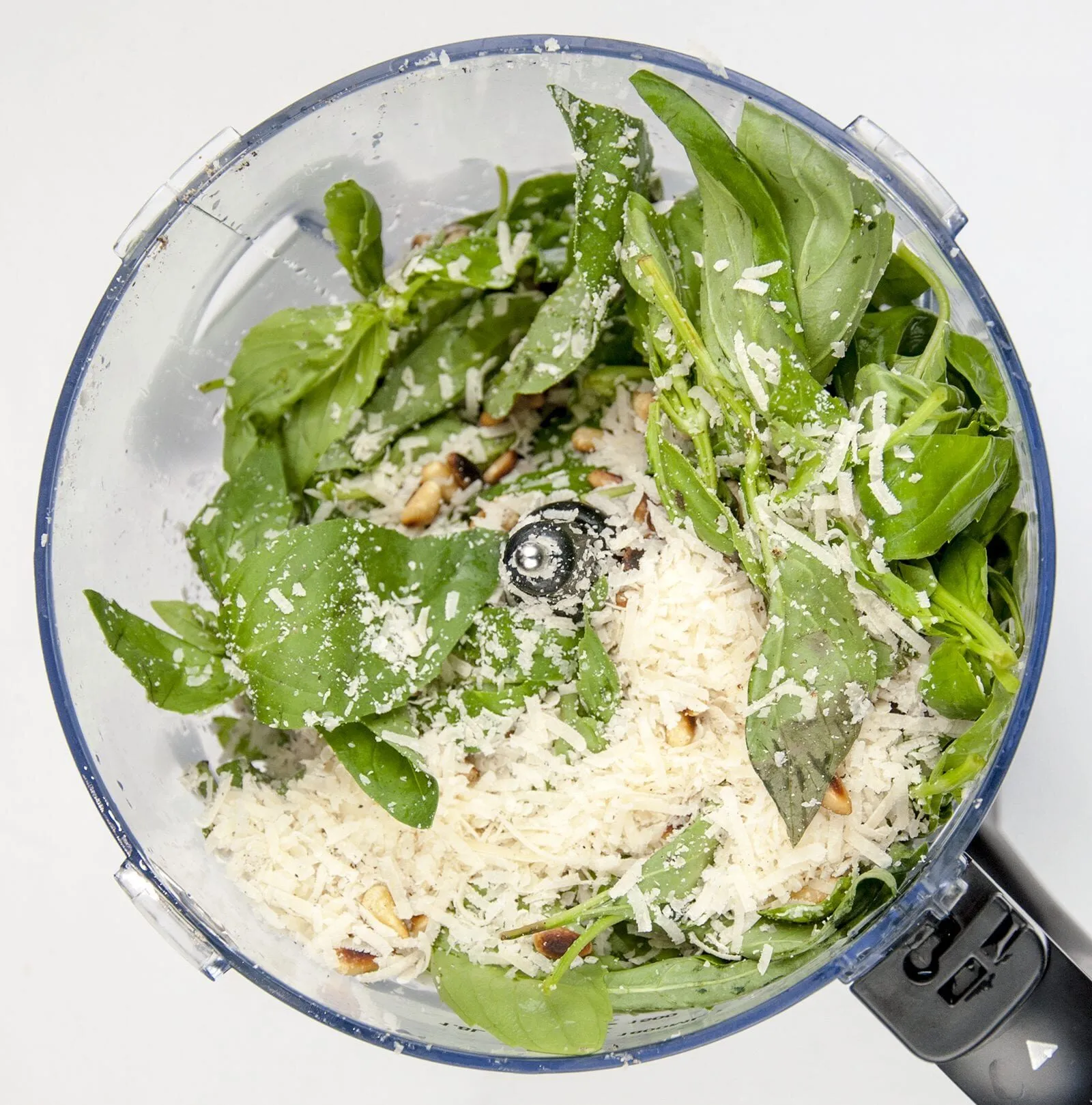 How to make pesto at home. The fresh taste of Italy. Just 5 ingredients in this wonderful vegetarian recipe. Basil, garlic, pine nuts, olive oil and parmesan cheese. Fantastic for pasta. Yum! | theyumyumclub.com