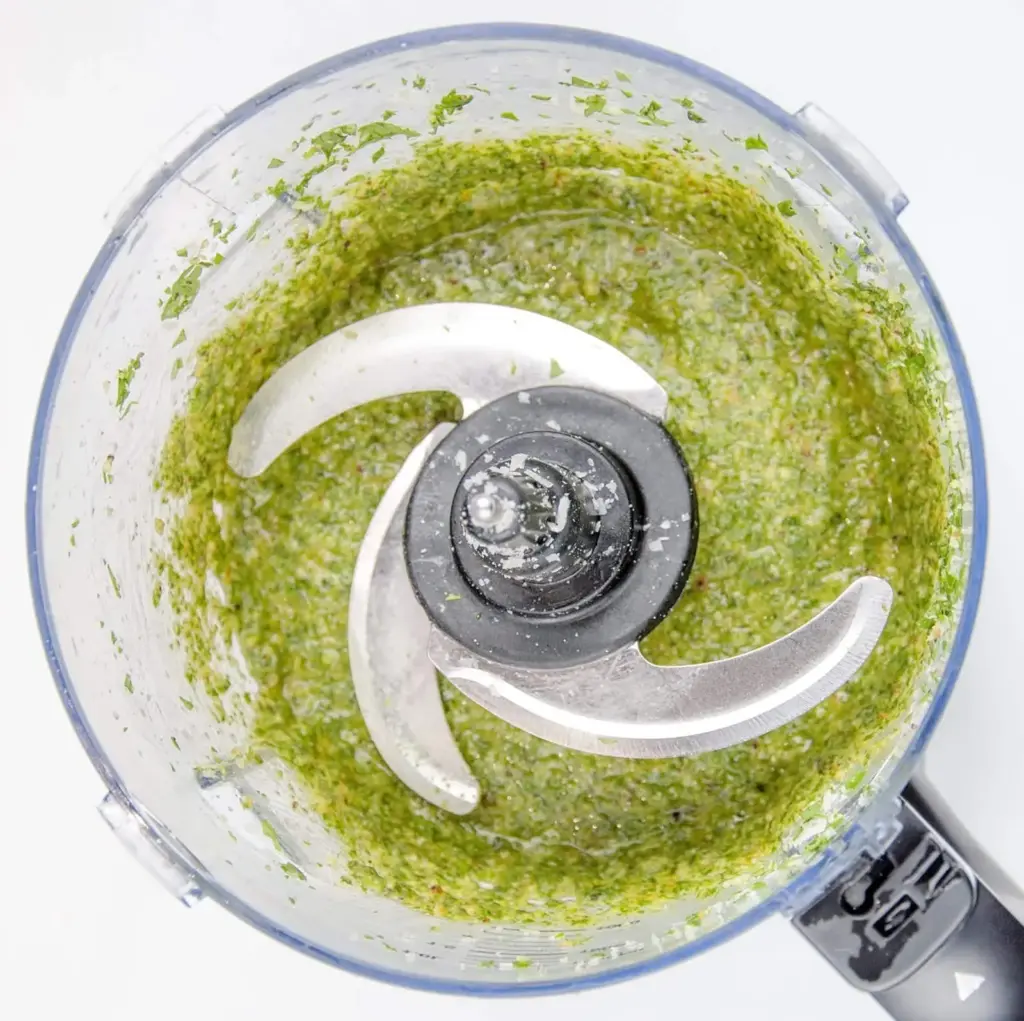 How to make pesto at home. The fresh taste of Italy. Just 5 ingredients in this wonderful vegetarian recipe. Basil, garlic, pine nuts, olive oil and parmesan cheese. Fantastic for pasta. Yum! | theyumyumclub.com
