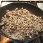 Succulent mushroom duxelle stuffed chicken breast. Pan-fried in a skillet and finished off in the oven. A wonderful, tasty and healthy chicken recipe. Yum! | theyumyumclub.com