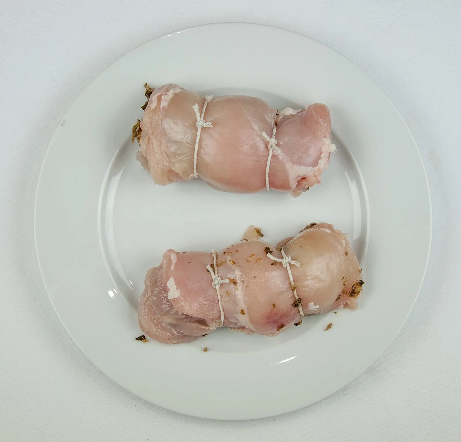 Succulent mushroom duxelle stuffed chicken breast. Pan-fried in a skillet and finished off in the oven. A wonderful, tasty and healthy chicken recipe. Yum! | theyumyumclub.com