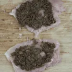 Succulent mushroom duxelle stuffed chicken breast. Pan-fried in a skillet and finished off in the oven. A wonderful, tasty and healthy chicken recipe. Yum! | theyumyumclub.com