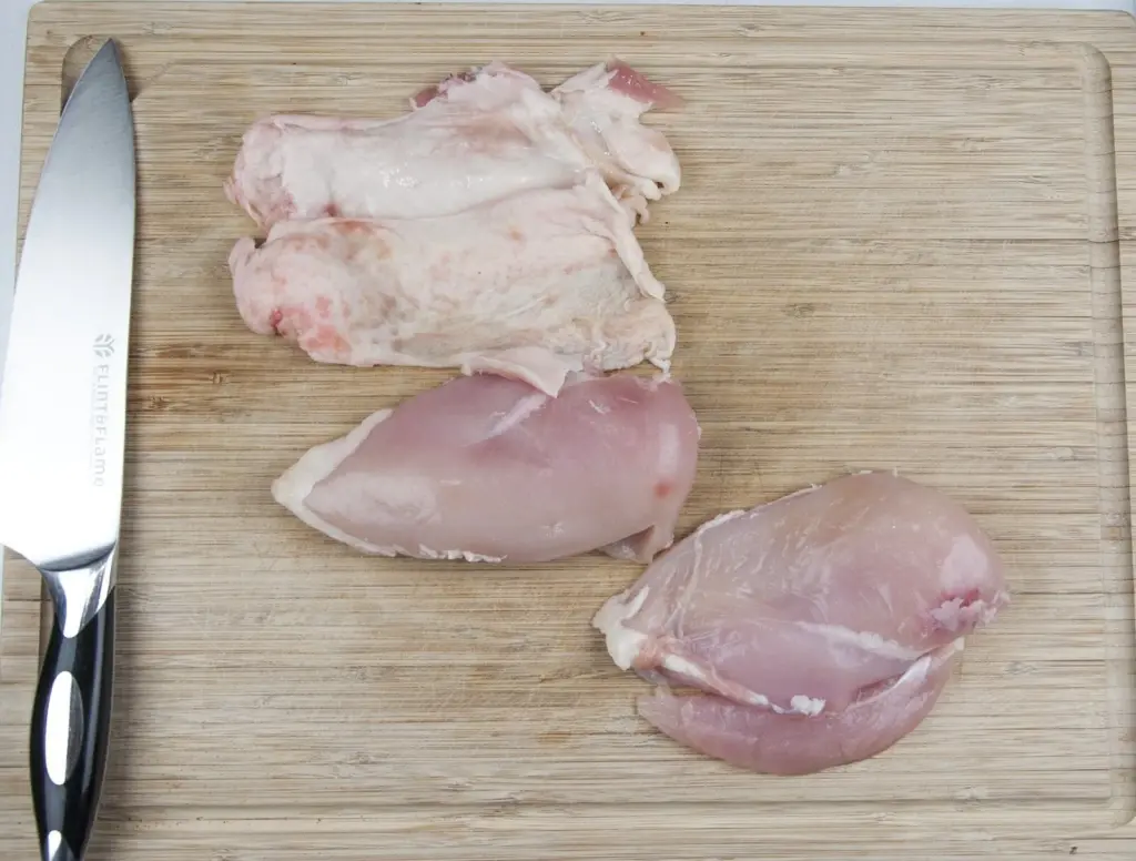 Succulent mushroom duxelle stuffed chicken breast. Pan-fried in a skillet and finished off in the oven. A wonderful, tasty and healthy chicken recipe. Yum! | theyumyumclub.com