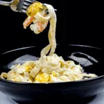 Classic smoked haddock and prawn tagliatelle. What a stunning seafood recipe. The smokiness of the poached haddock sauce. Fantastic, and healthy too. Yum! | theyumyumclub.com