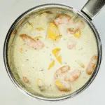 Classic smoked haddock and prawn tagliatelle. What a stunning seafood recipe. The smokiness of the poached haddock sauce. Fantastic, and healthy too. Yum! | theyumyumclub.com