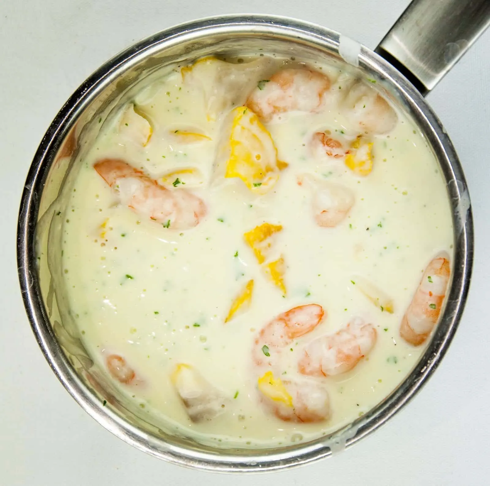Classic smoked haddock and prawn tagliatelle. What a stunning seafood recipe. The smokiness of the poached haddock sauce. Fantastic, and healthy too. Yum! | theyumyumclub.com