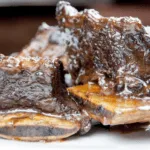 Look at this wonderful and tender slow-cooked braised short rib. Mouthwatering right? It takes some time to cook but hardly any time to prepare. Make it in the morning and go enjoy the rest of your day. It will be ready waiting for you as dinner time rolls along! Yum! | theyumyumclub.com