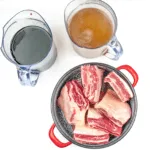 Look at this wonderful and tender slow-cooked braised short rib. Mouthwatering right? It takes some time to cook but hardly any time to prepare. Make it in the morning and go enjoy the rest of your day. It will be ready waiting for you as dinner time rolls along! Yum! | theyumyumclub.com