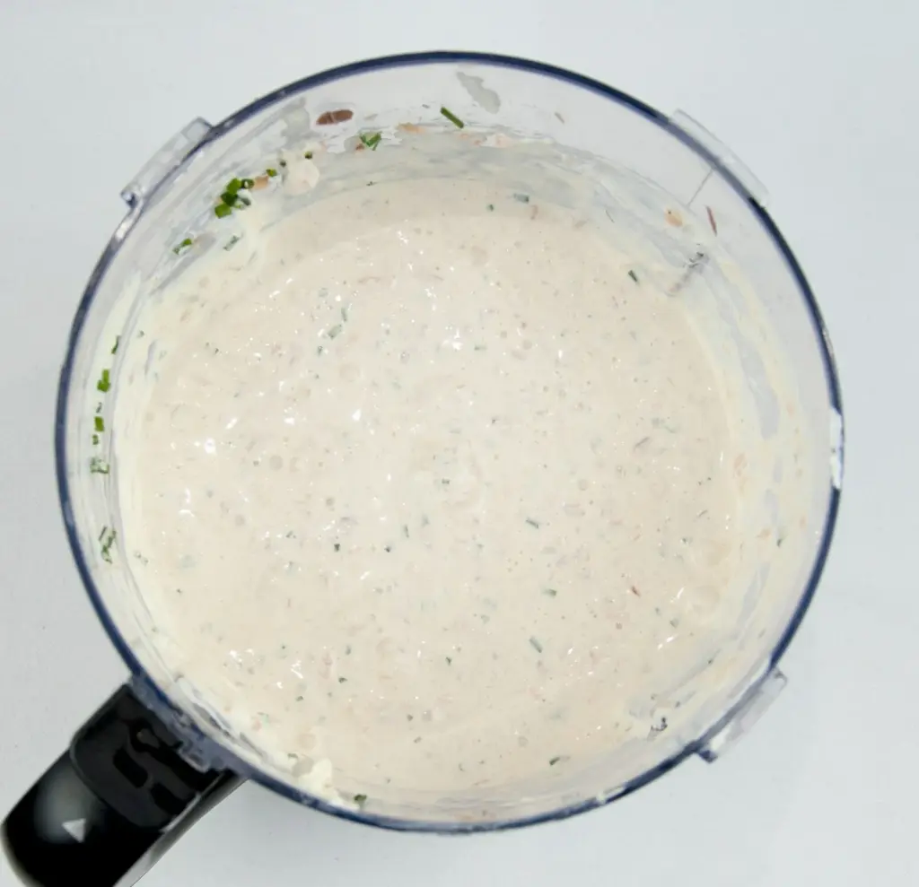 Just look at this individual smoked salmon terrine. I love this recipe. So tasty and a dish that will impress your friends at any dinner party. Hot and cold smoked salmon, cream cheese with chives, and even topped with a little caviar. Yum! | theyumyumclub.com