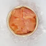 Just look at this individual smoked salmon terrine. I love this recipe. So tasty and a dish that will impress your friends at any dinner party. Hot and cold smoked salmon, cream cheese with chives, and even topped with a little caviar. Yum! | theyumyumclub.com