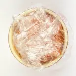 Just look at this individual smoked salmon terrine. I love this recipe. So tasty and a dish that will impress your friends at any dinner party. Hot and cold smoked salmon, cream cheese with chives, and even topped with a little caviar. Yum! | theyumyumclub.com