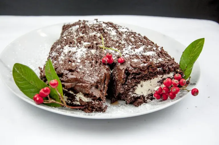 Christmas is here and it's time to start baking. How about a Yule Log? Festive chocolate bliss & the kids can help! I'll show you how with this easy recipe. | theyumyumclub.com