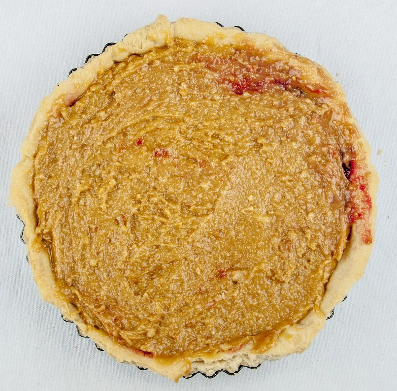 Have a savoury palate but still love puddings? Try this alternative to traditional marzipan Bakewell tart. The great taste of peanut butter, in a tart! Yum! | theyumyumclub.com