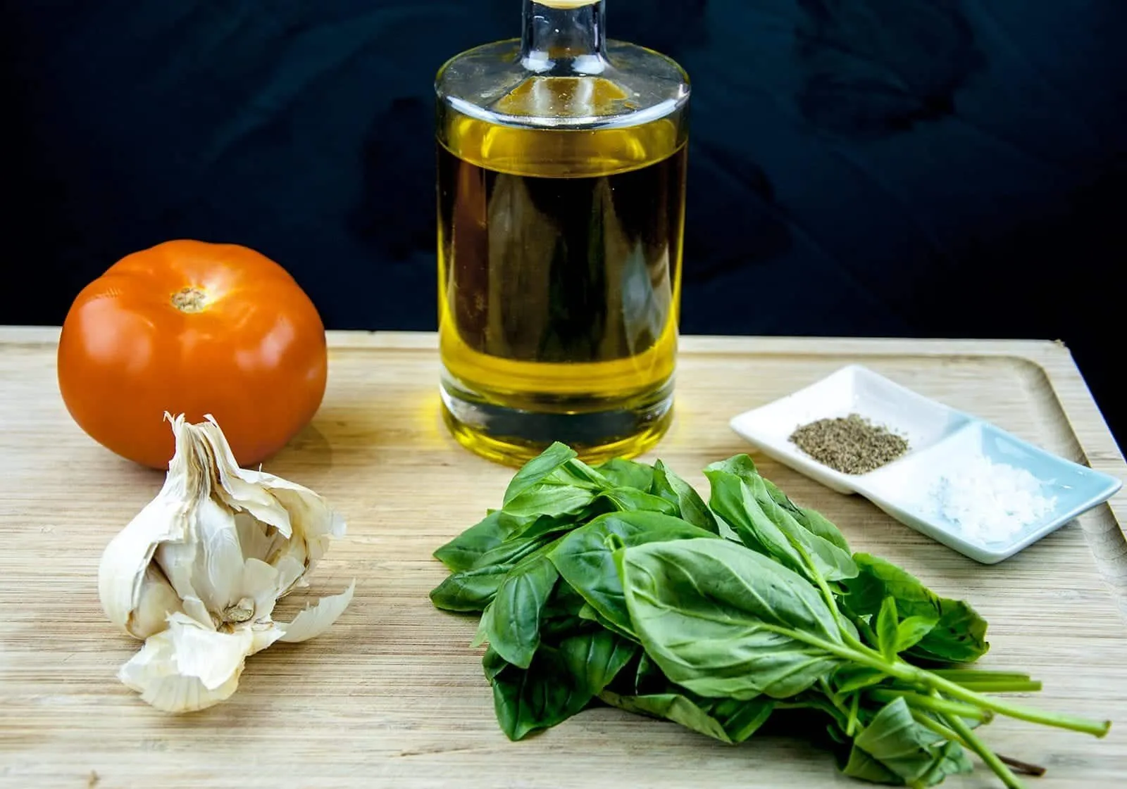 Enjoy the taste of Italy in this homemade bruschetta. Wonderful garlic, tomato concasse, basil, and extra virgin olive oil. Make the bread too if you like! | theyumyumclub.com
