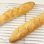 Nothing's better than the smell of freshly baked bread first thing. Ok, you have to get up early but it's worth it ????. Freshly baked French baguettes. Yum! | theyumyumclub.com
