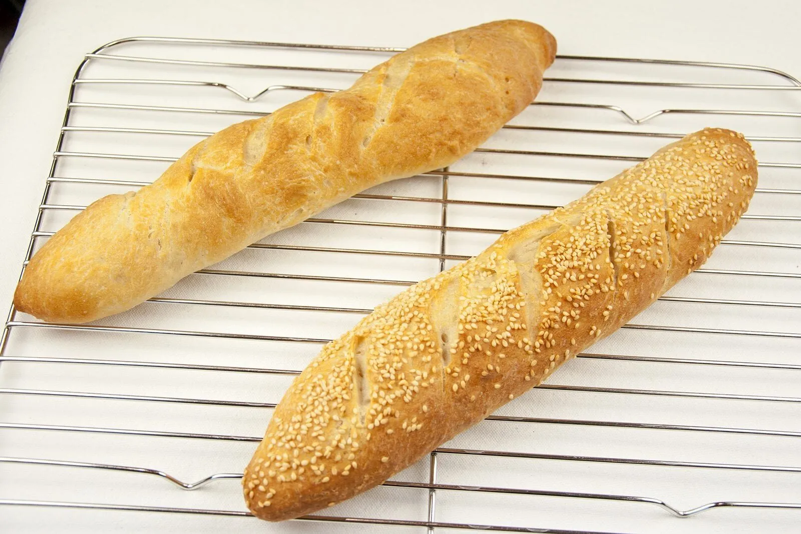 Nothing's better than the smell of freshly baked bread first thing. Ok, you have to get up early but it's worth it ????. Freshly baked French baguettes. Yum! | theyumyumclub.com
