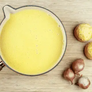 Cream of garlic and onion soup. How much more French can you get? Just remember, if you're planning on kissing after dinner you'll need to share...???? Yum! | theyumyumclub.com