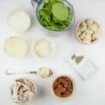 This creamy chicken gnocchi recipe brings the taste of Italy right to your own kitchen. Black olives. Sun-dried tomatoes. Baby spinach. Sounds good right? Yum! | theyumyumclub.com