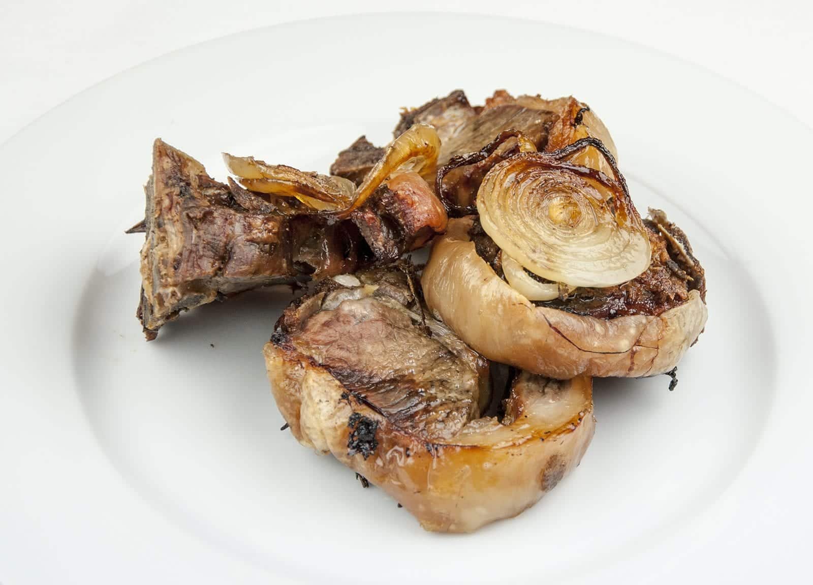 Look at these wonderfully succulent slow roasted lamb chops. Mouth-watering lamb cooked with garlic and rosemary. A midweek extravagance but why not eh? Go on, treat yourself. Yum! | theyumyumclub.com