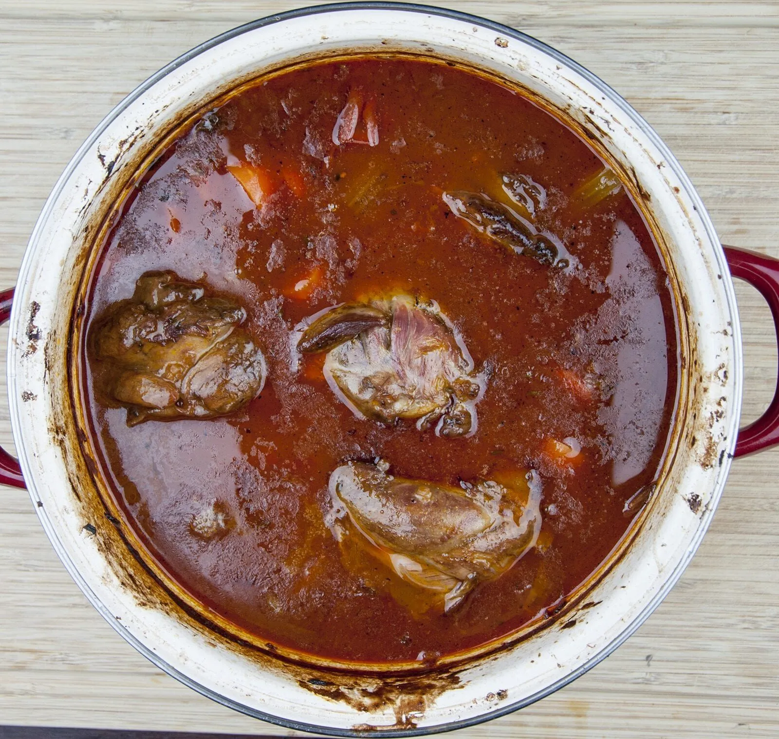 Pot roasted lamb shanks. Need I say more...? Surely the best cut of lamb there is. Slow roast in red wine and seasonal vegetables. Pure culinary bliss. Yum! | theyumyumclub.com
