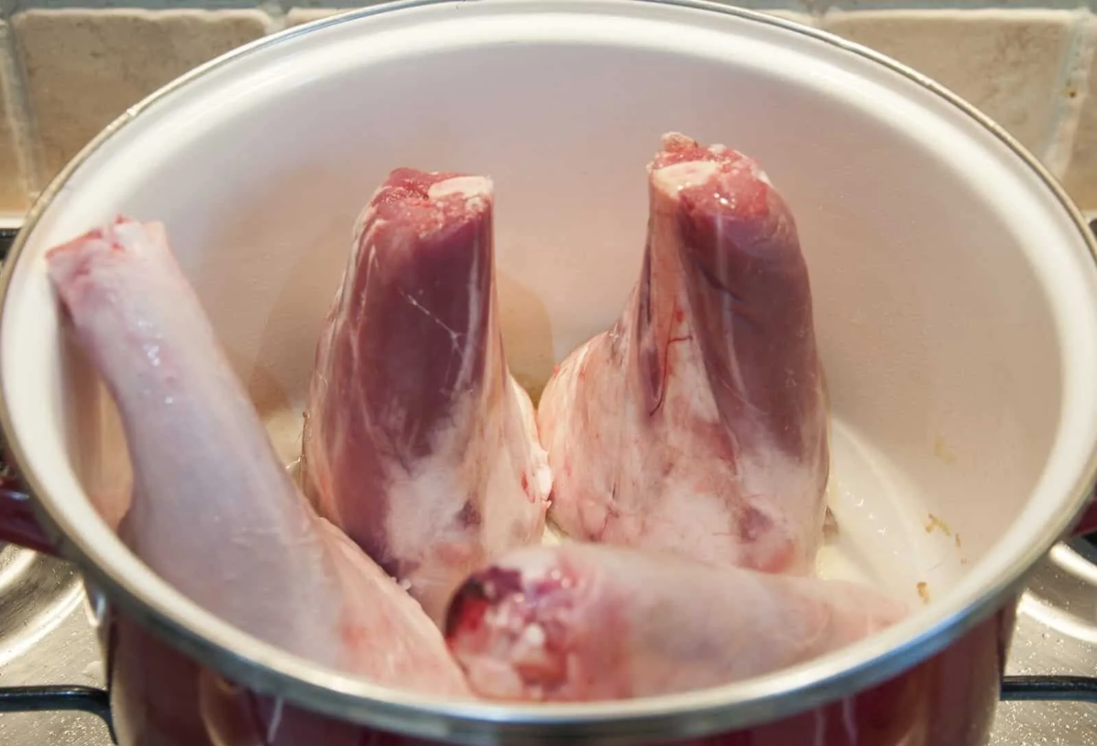 Pot roasted lamb shanks. Need I say more...? Surely the best cut of lamb there is. Slow roast in red wine and seasonal vegetables. Pure culinary bliss. Yum! | theyumyumclub.com