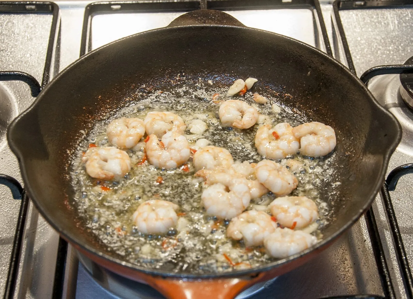 This is an amazing hot prawn salad. So tasty and so yummy. Yes, there's a touch of cheese and slaw but combined with the prawns, chilli and garlic! Wow!! | theyumyumclub.com
