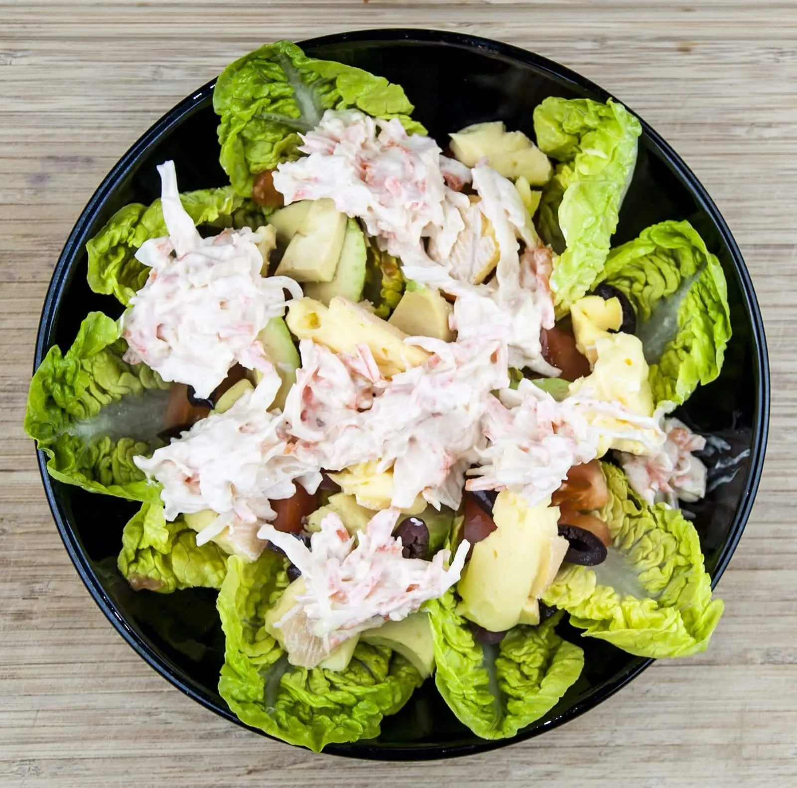 This is an amazing hot prawn salad. So tasty and so yummy. Yes, there's a touch of cheese and slaw but combined with the prawns, chilli and garlic! Wow!! | theyumyumclub.com