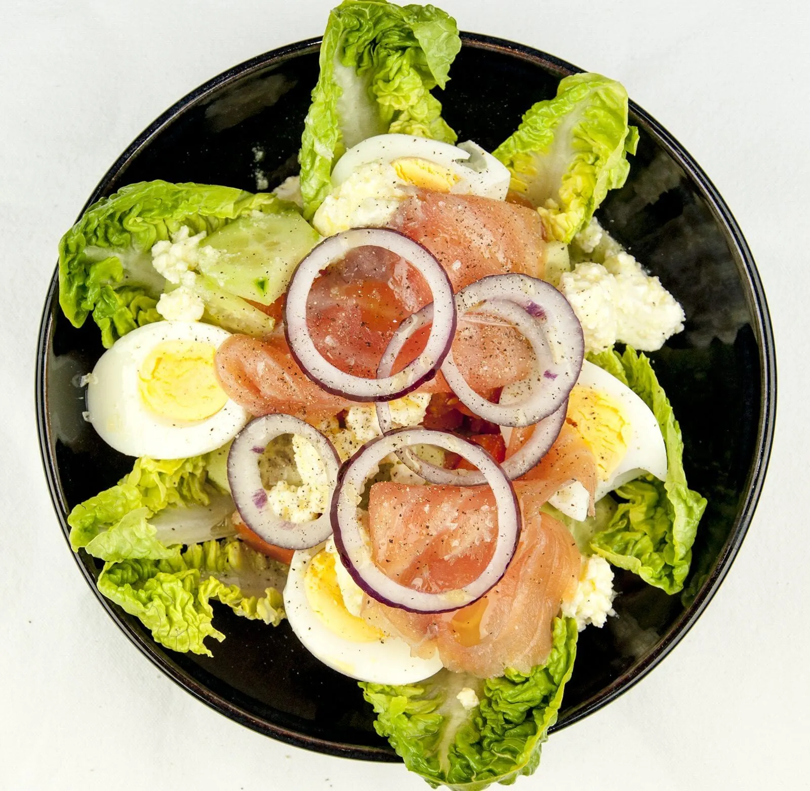 This is a fantastic smoked salmon and feta salad. The feta and the smokiness od the salmon really work. A touch of Greece in your own home Yum!