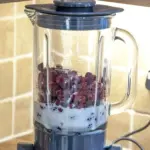This blackberry and raspberry smoothie is a very tasty and healthy smoothie. Just 4 ingredients. Blackberries, raspberries, milk, and vanilla essence. It takes no time to make and at 130 calories a serving you can't go wrong! Yum! | theyumyumclub.com