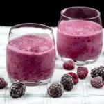 This blackberry and raspberry smoothie is a very tasty and healthy smoothie. Just 4 ingredients. Blackberries, raspberries, milk, and vanilla essence. It takes no time to make and at 130 calories a serving you can't go wrong! Yum! | theyumyumclub.com