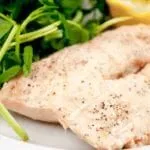 Steamed salmon in white wine. A touch of dill too. A wonderfully healthy recipe and great for lunch or dinner. 10 minutes cooking and you're done. Yum! | theyumyumclub.com