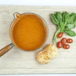 Traditional and classic tomato and basil soup. What a recipe! Tasty, creamy and at only 169 calories per serving, very healthy too!! If you miss out the scones... ???? Yum! | theyumyumclub.com
