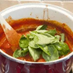 Traditional and classic tomato and basil soup. What a recipe! Tasty, creamy and at only 169 calories per serving, very healthy too!! If you miss out the scones... ???? Yum! | theyumyumclub.com