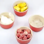 Watermelon and pineapple smoothie! So tasty and just 4 ingredients! Watermelon, pineapple, Greek yoghurt, and ice. 1% fat and less than 200 calories! Yum! | theyumyumclub.com